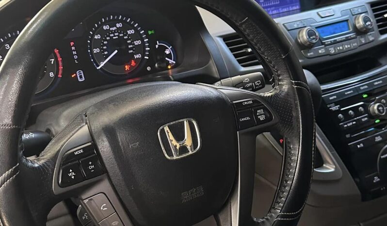 
								Honda Odyssey 2011 lleno									