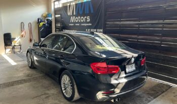 
									BMW 320i 2016 lleno								