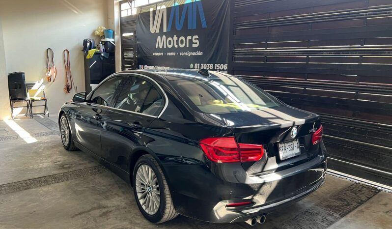 
								BMW 320i 2016 lleno									