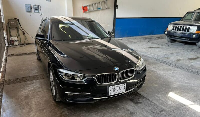 
								BMW 320i 2016 lleno									